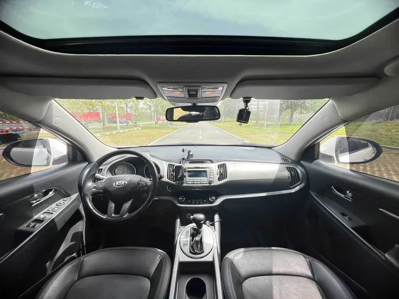 Kia Sportage — фото 11