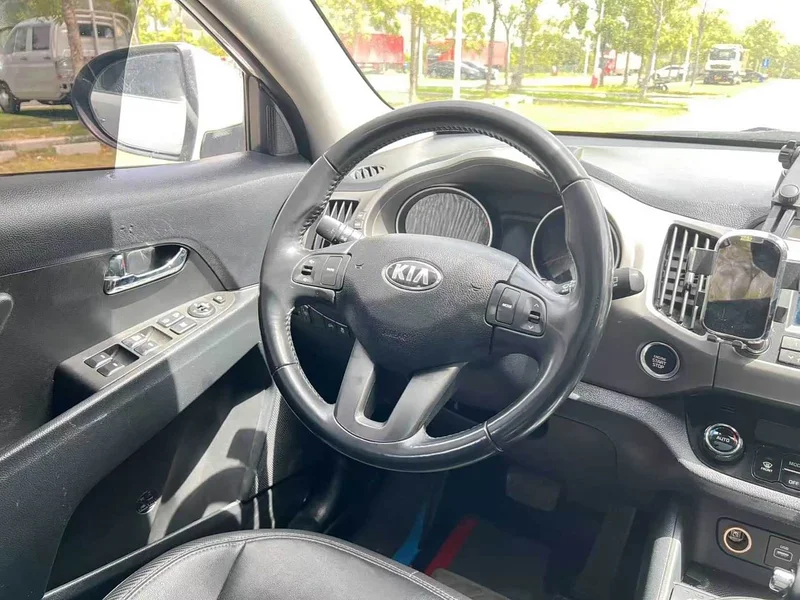 Kia Sportage — фото 12