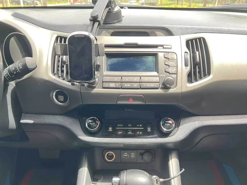 Kia Sportage — фото 13