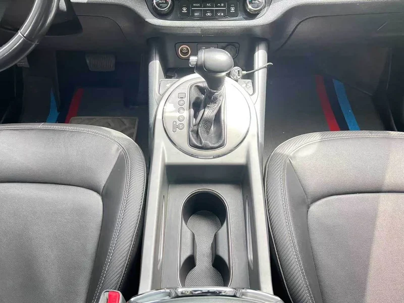 Kia Sportage — фото 14