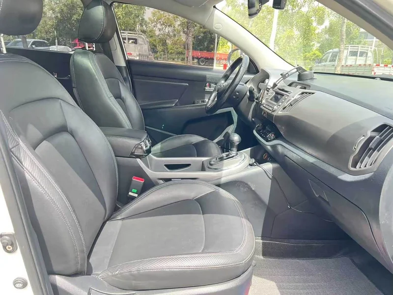 Kia Sportage — фото 17