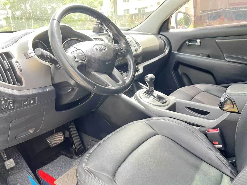Kia Sportage — фото 6