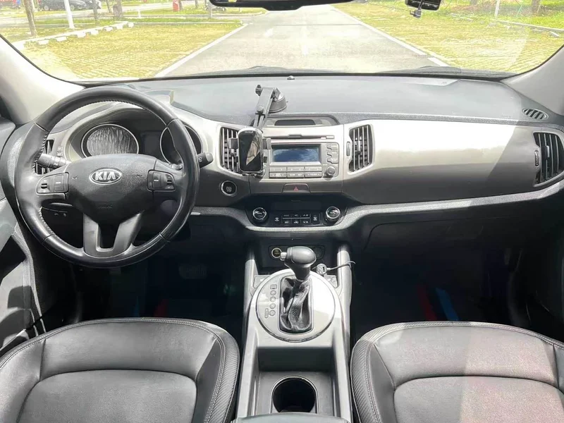 Kia Sportage — фото 10