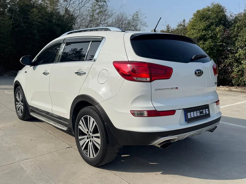 Kia Sportage — фото 7