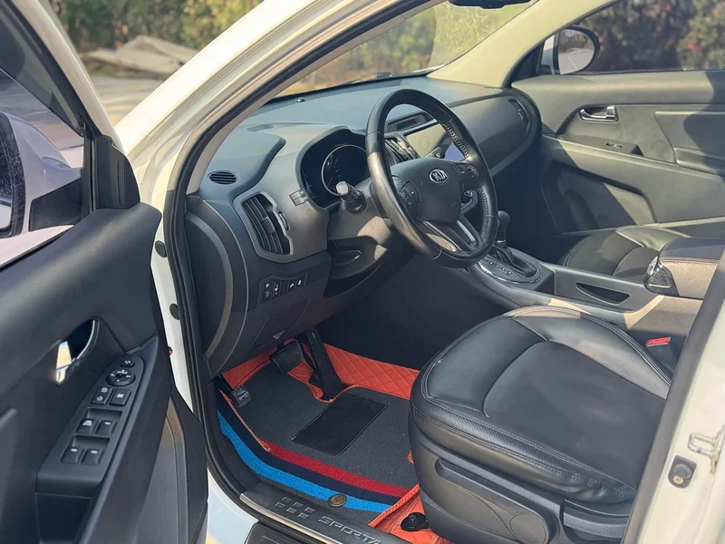 Kia Sportage — фото 8