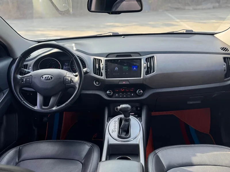 Kia Sportage — фото 10