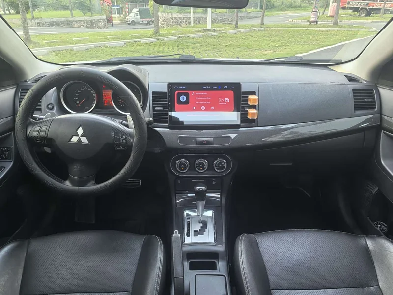 Mitsubishi Lancer EX — фото 11