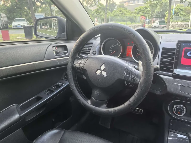 Mitsubishi Lancer EX — фото 12