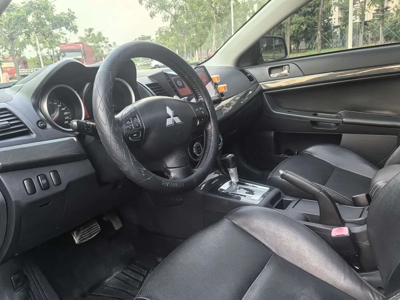 Mitsubishi Lancer EX — фото 8