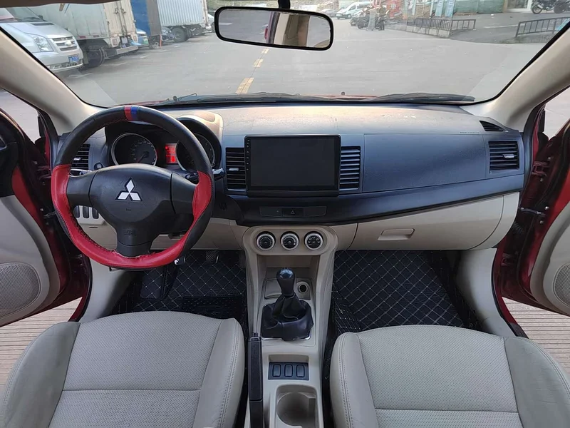 Mitsubishi Lancer EX — фото 11