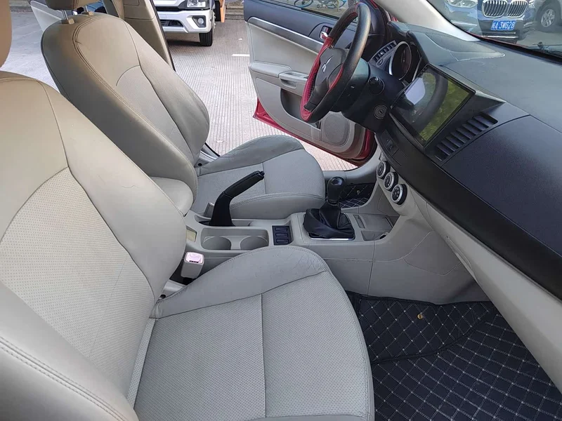 Mitsubishi Lancer EX — фото 9