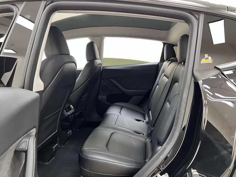 Tesla Model Y — фото 16