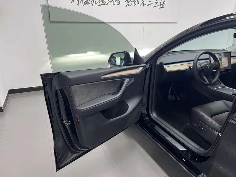 Tesla Model Y — фото 14
