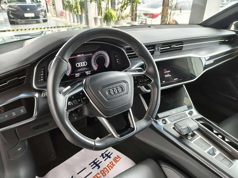 Audi A7L — фото 8