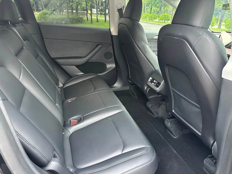 Tesla Model Y — фото 14