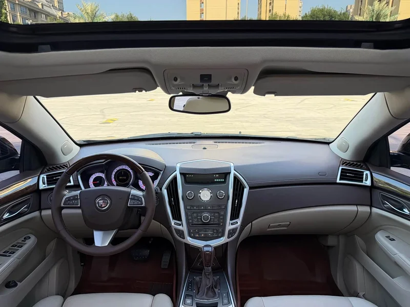 Cadillac SRX — фото 12