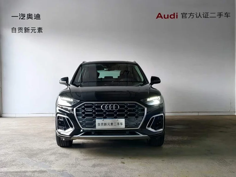 Audi Q5L — фото 14