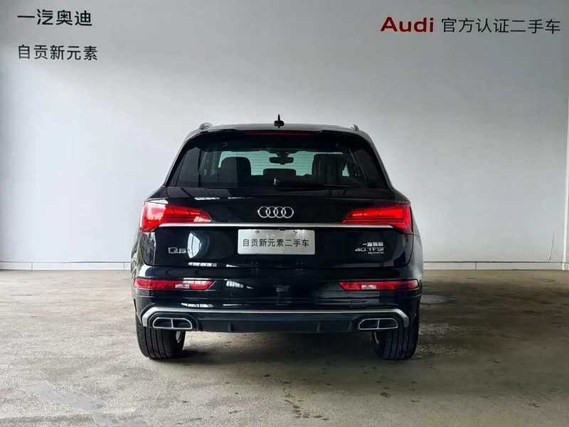 Audi Q5L — фото 15