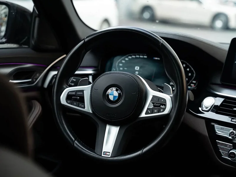 BMW 5-Series — фото 10