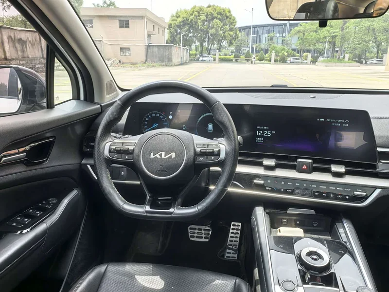 Kia Sportage — фото 13