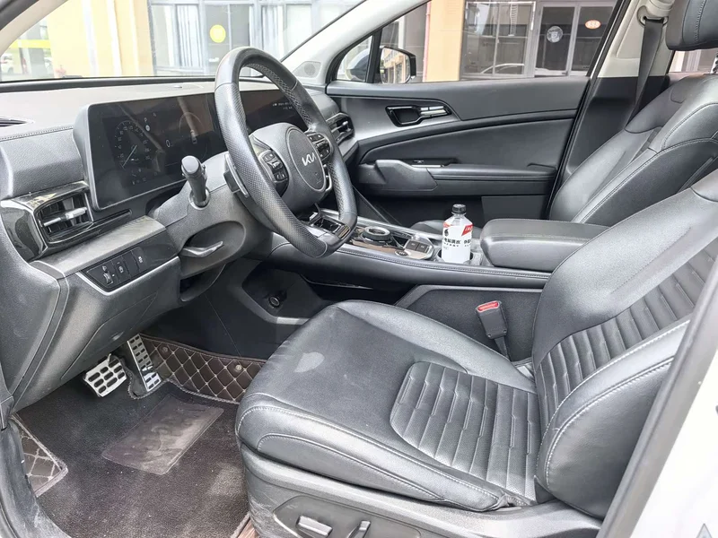 Kia Sportage — фото 14