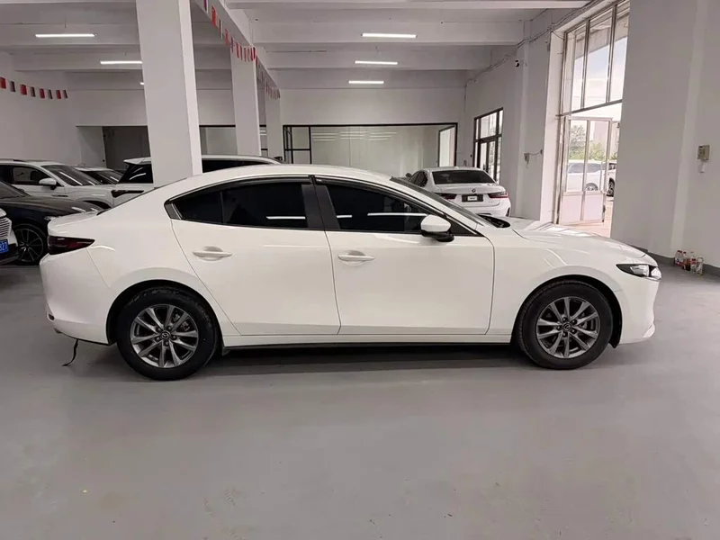 Mazda 3 Axela — фото 4