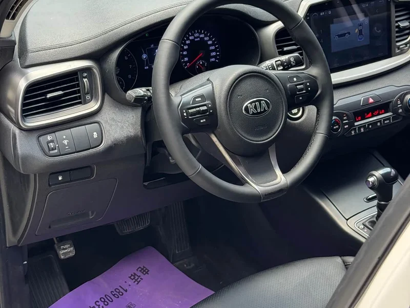 Kia Sorento — фото 11