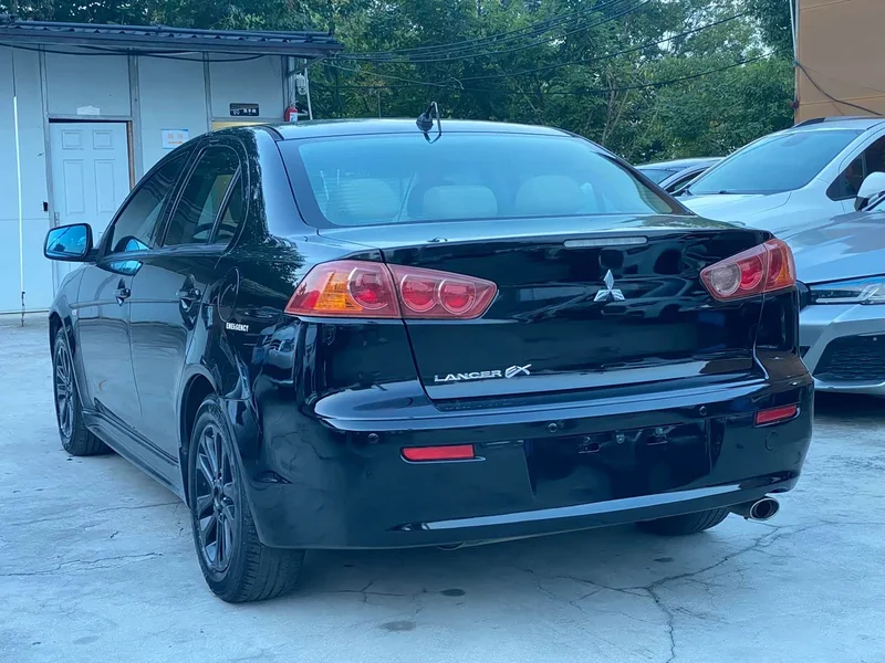 Mitsubishi Lancer EX — фото 12