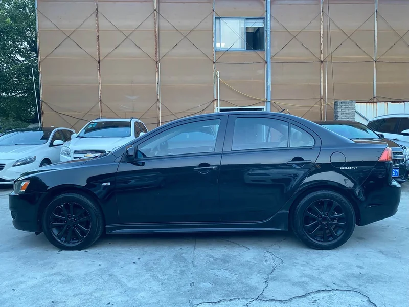 Mitsubishi Lancer EX — фото 9