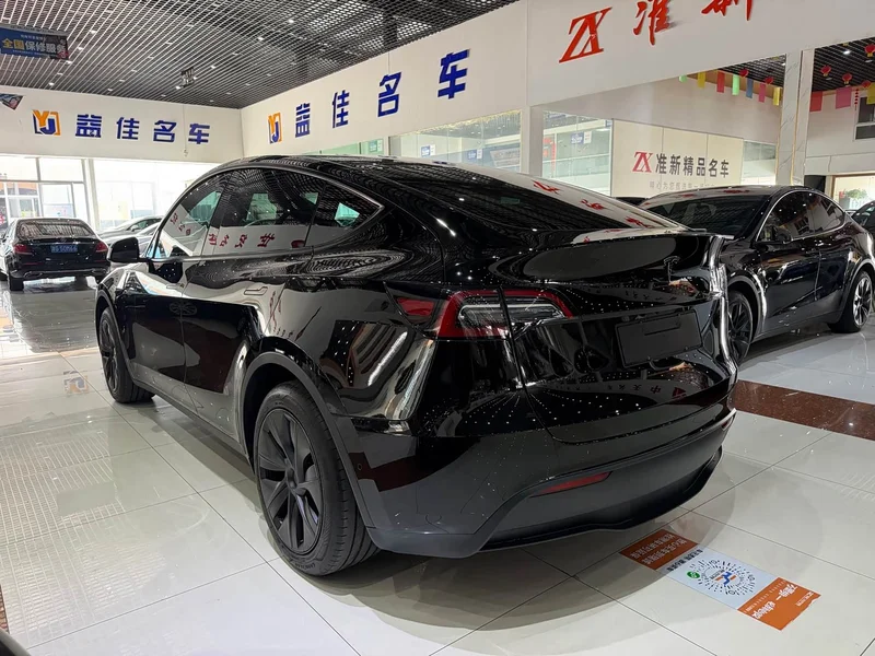 Tesla Model Y — фото 15