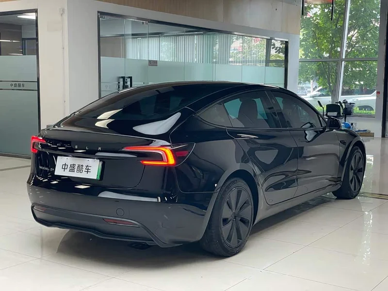Tesla Model 3 — фото 26