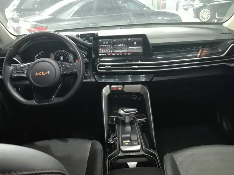 Kia Sportage — фото 12