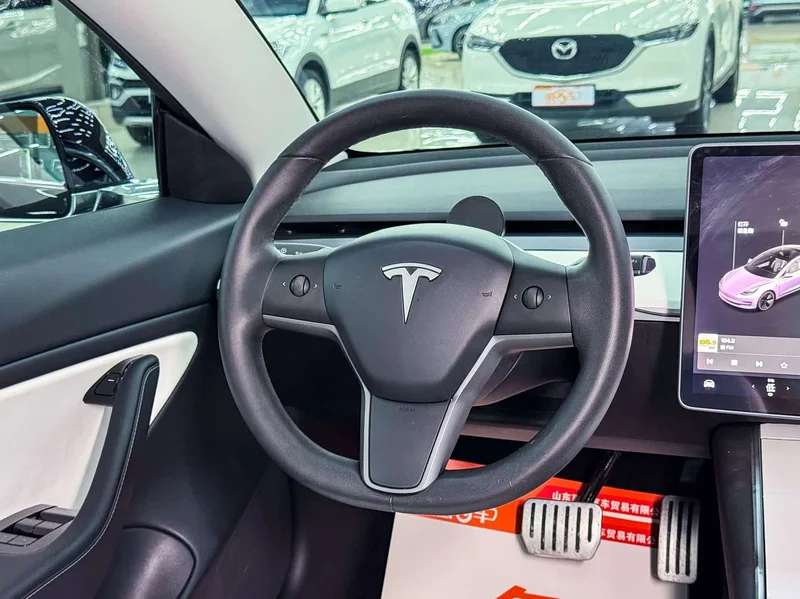Tesla Model 3 — фото 11