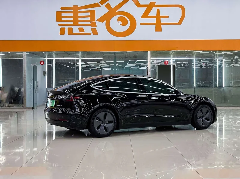 Tesla Model 3 — фото 19