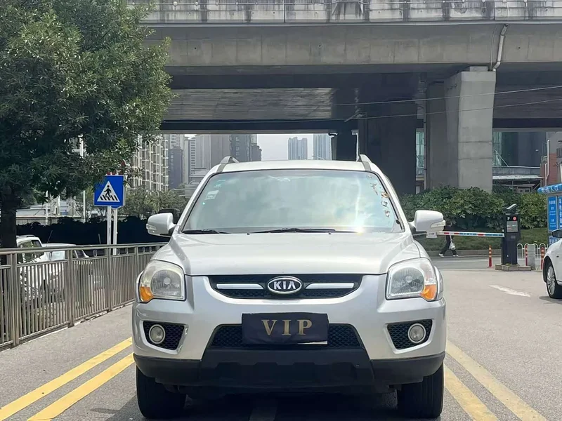 Kia Sportage — фото 1
