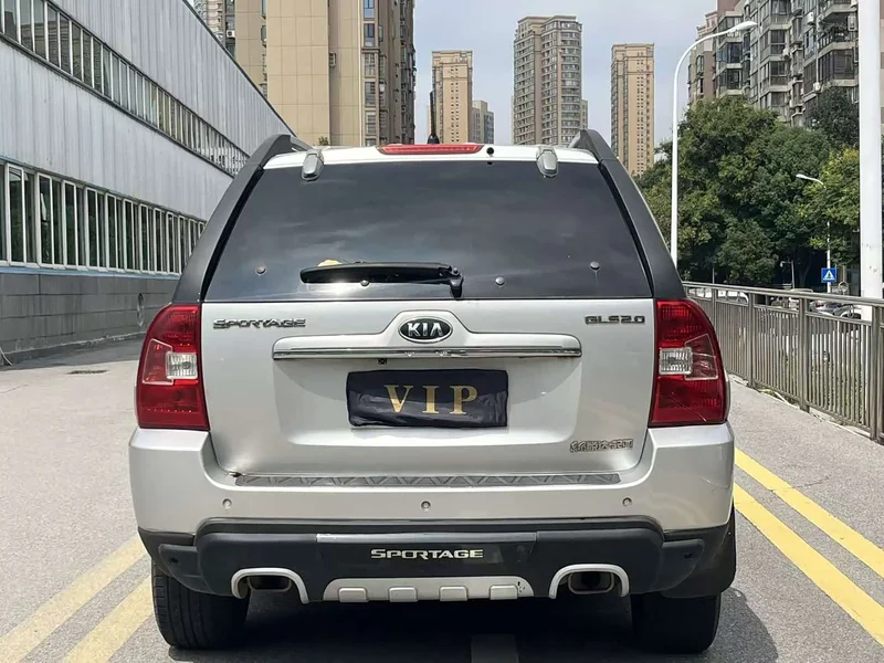 Kia Sportage — фото 7