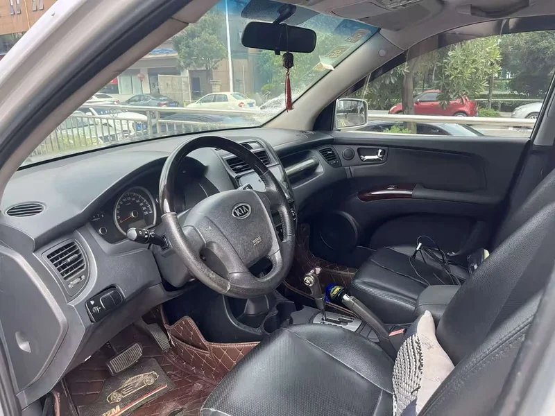 Kia Sportage — фото 8
