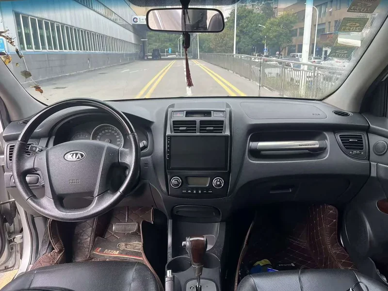 Kia Sportage — фото 9