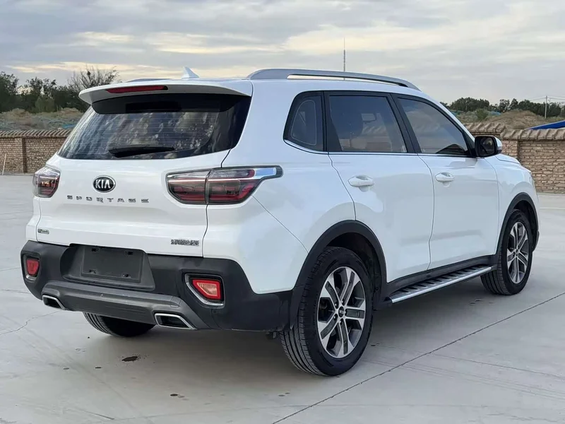 Kia Sportage — фото 9