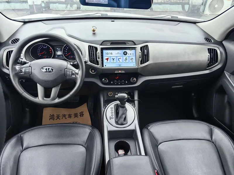 Kia Sportage — фото 10
