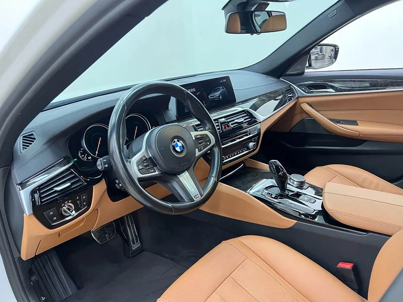 BMW 5-Series — фото 15