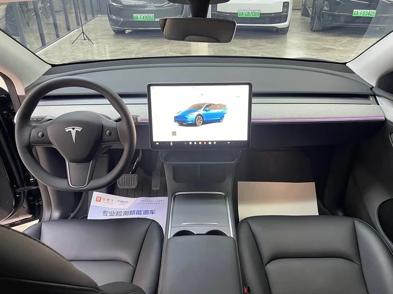 Tesla Model Y — фото 14