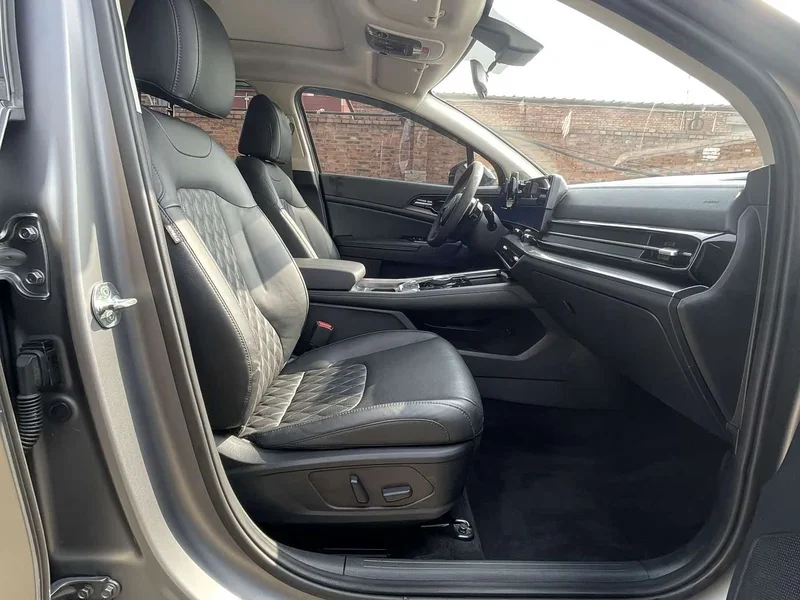 Kia Sportage — фото 9