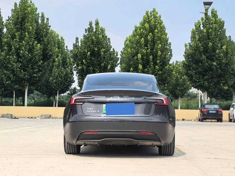 Tesla Model 3 — фото 19
