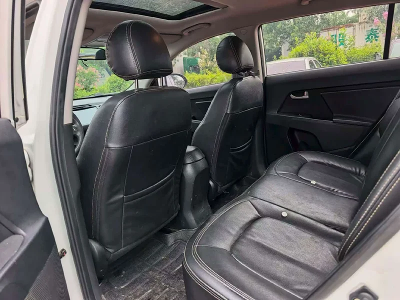 Kia Sportage — фото 7