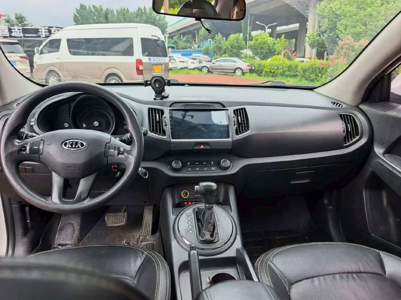 Kia Sportage — фото 8