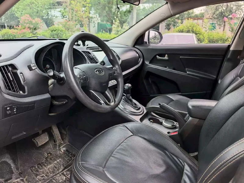 Kia Sportage — фото 9