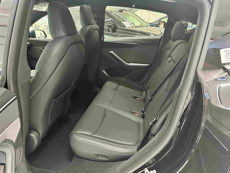 Tesla Model Y — фото 14