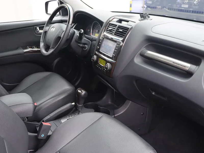 Kia Sportage — фото 9