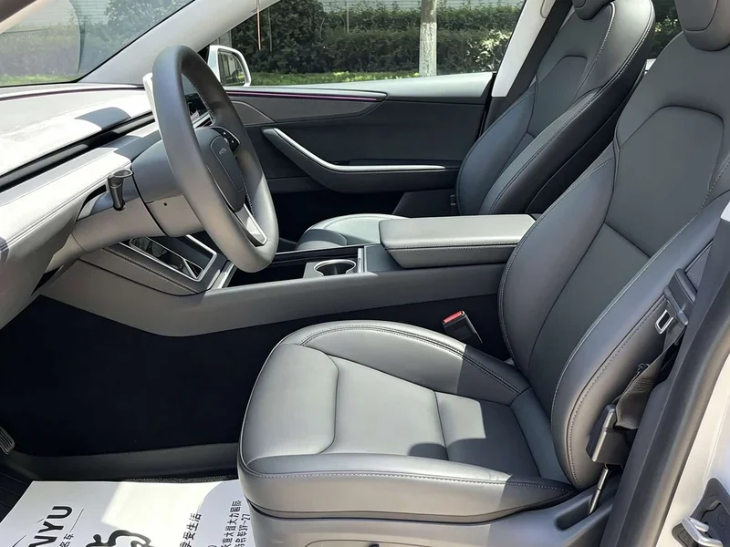 Tesla Model Y — фото 13